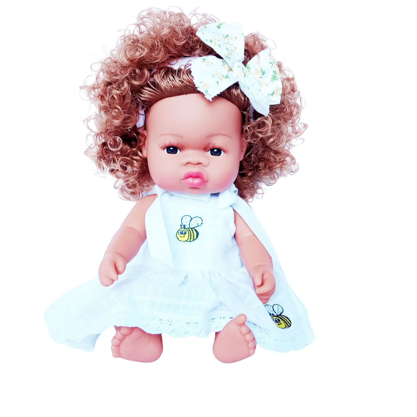 Doll in a white cotton sundress with embroidered bees, lace trim, and tied shoulder straps, accessorized with a matching bow headband, fits 34 cm dolls like Paola Reina or Baby Born