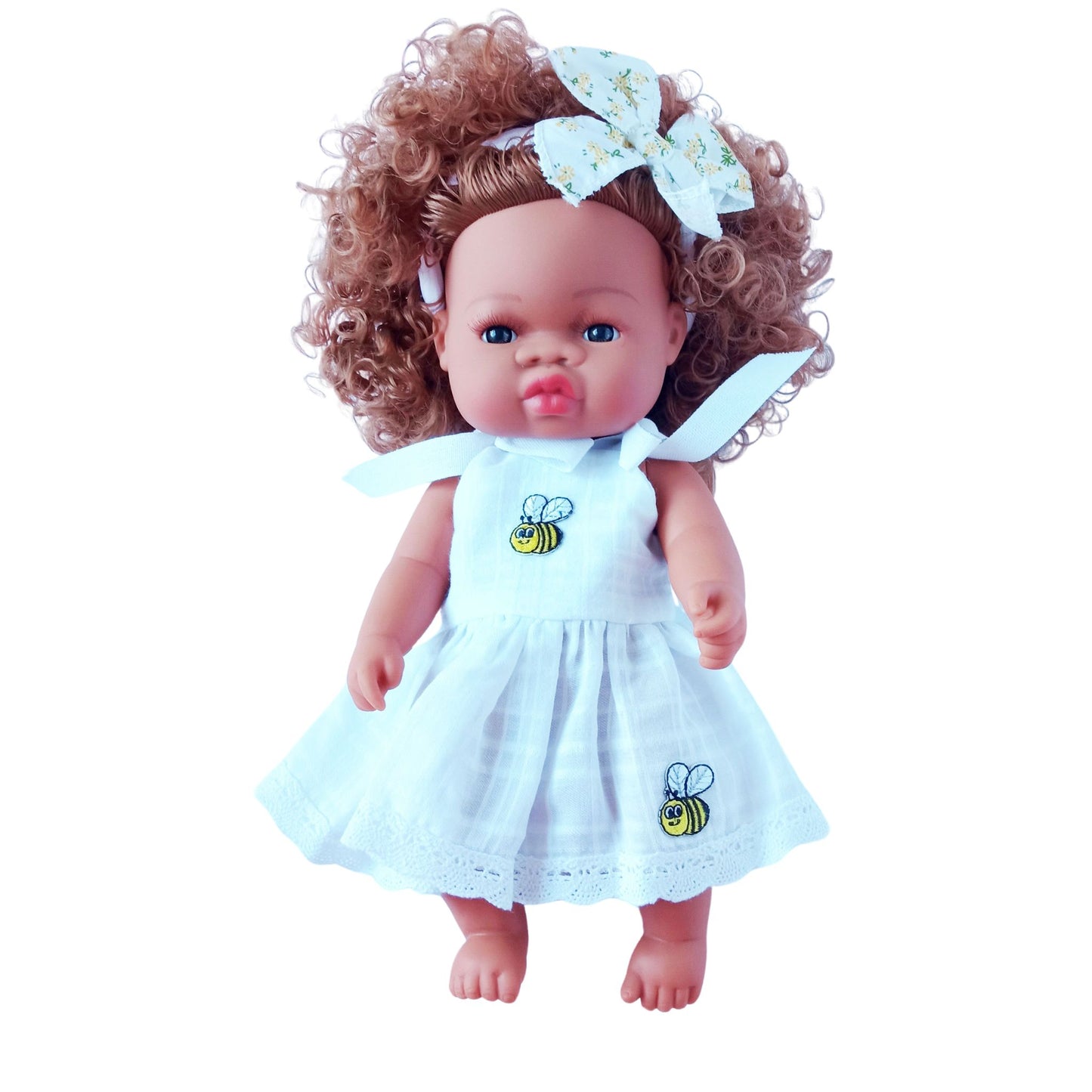 Doll in a white cotton sundress with embroidered bees, lace trim, and tied shoulder straps, accessorized with a matching bow headband, fits 34 cm dolls like Paola Reina or Baby Born