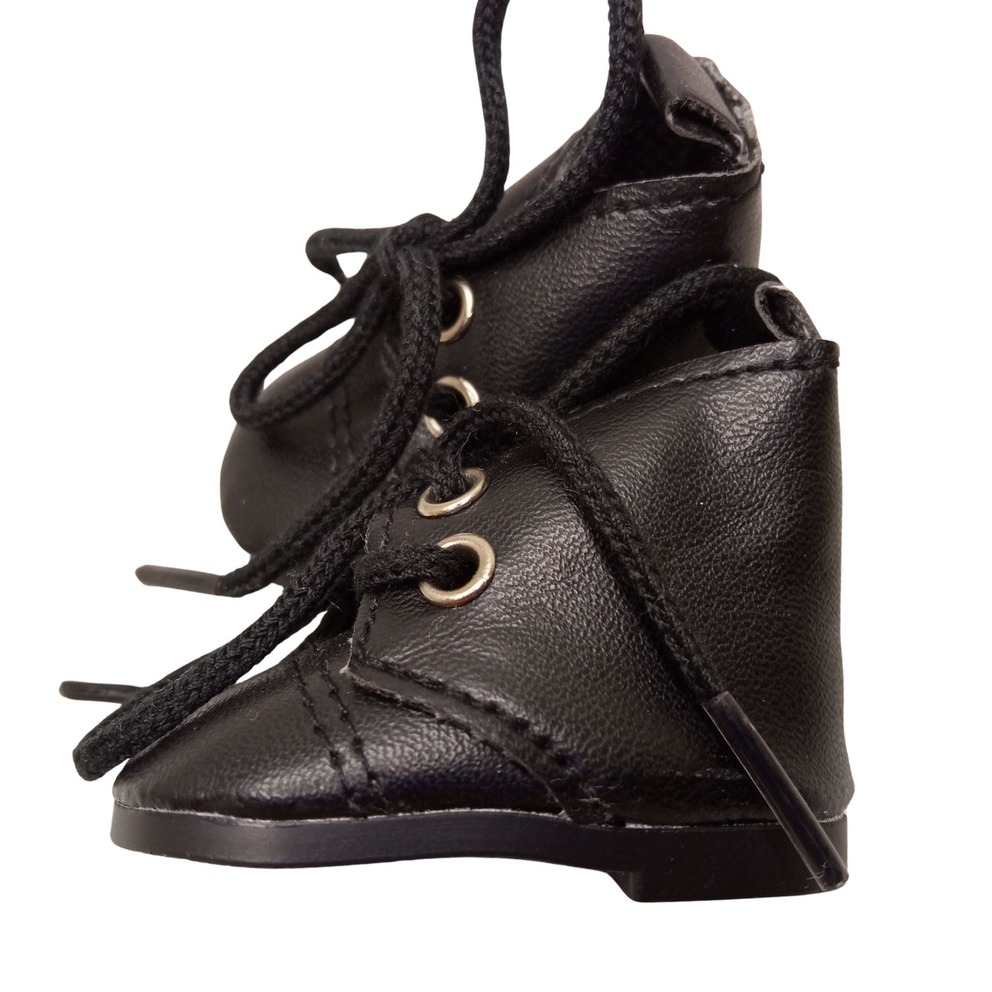 Sleek black lace-up boots for 32 cm Paola Reina dolls with matching black laces and sturdy soles, perfect for stylish and adventurous outfits.