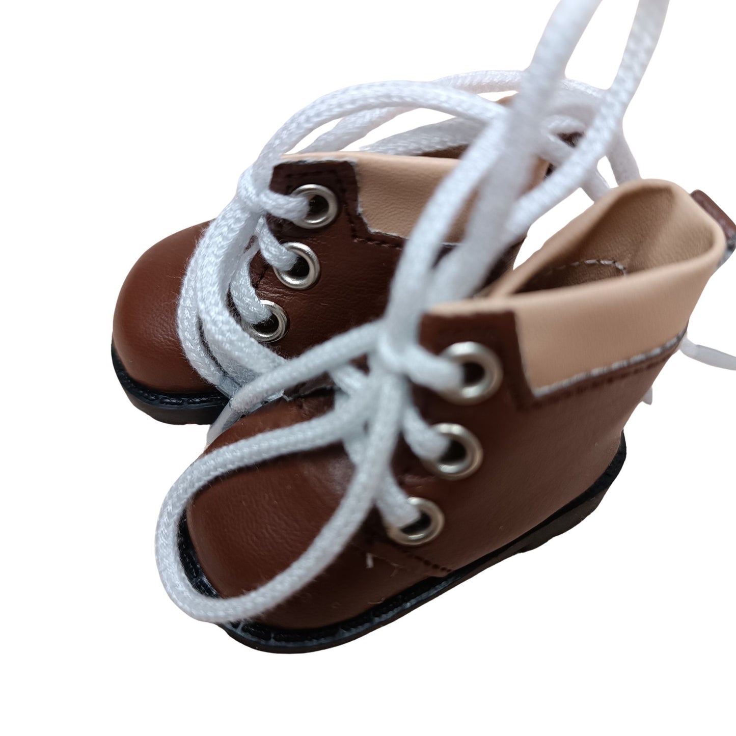Brown lace-up boots with beige cuffs, designed for 32 cm Paola Reina dolls. Featuring white laces, silver eyelets, and black soles for a classic explorer look.