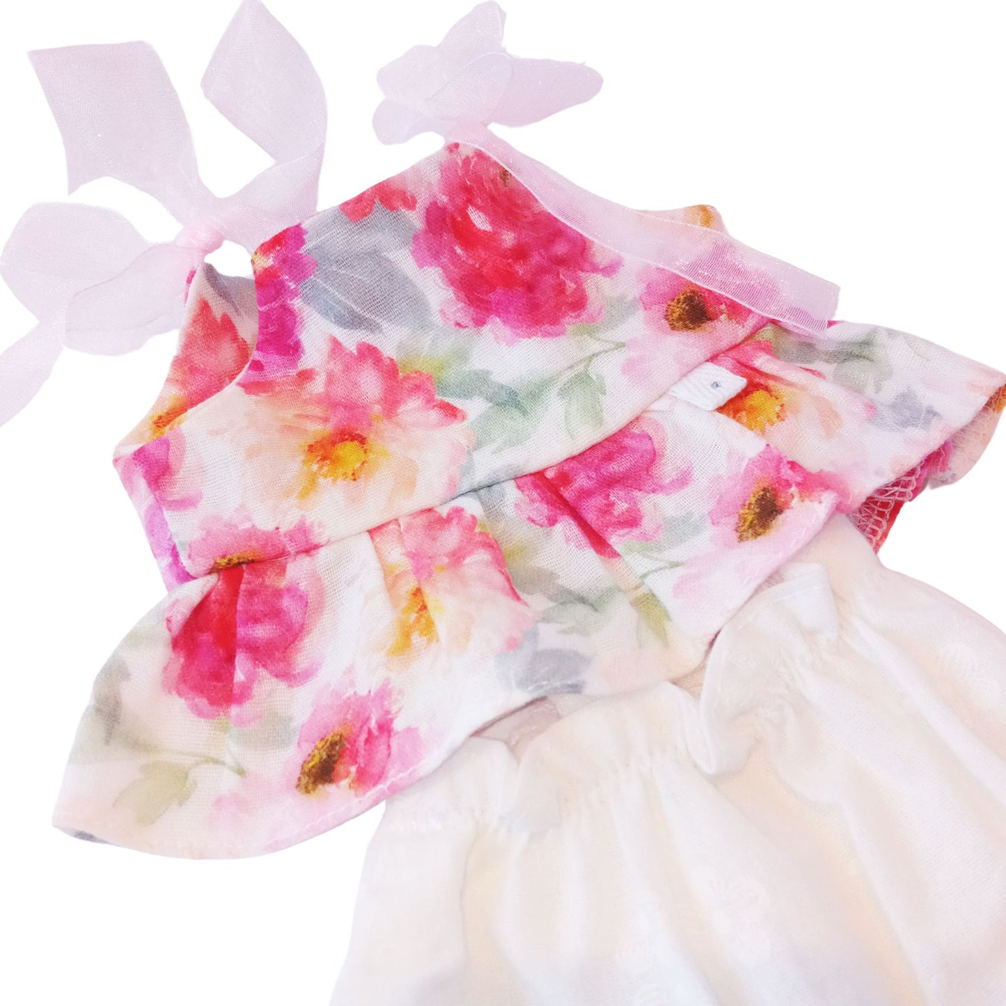Doll wearing floral cotton top and white bloomers, styled for 34 cm dolls like Paola Reina and Baby Born.