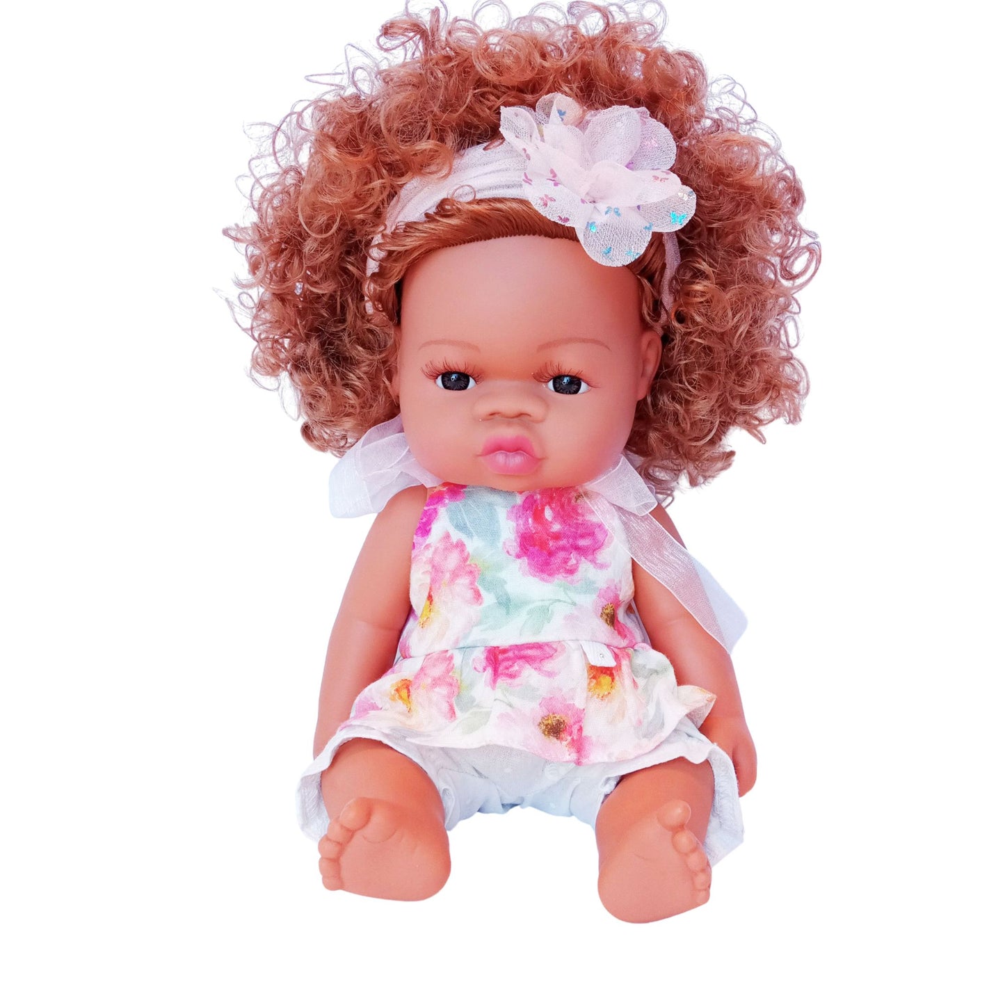 Doll wearing floral cotton top and white bloomers, styled for 34 cm dolls like Paola Reina and Baby Born.