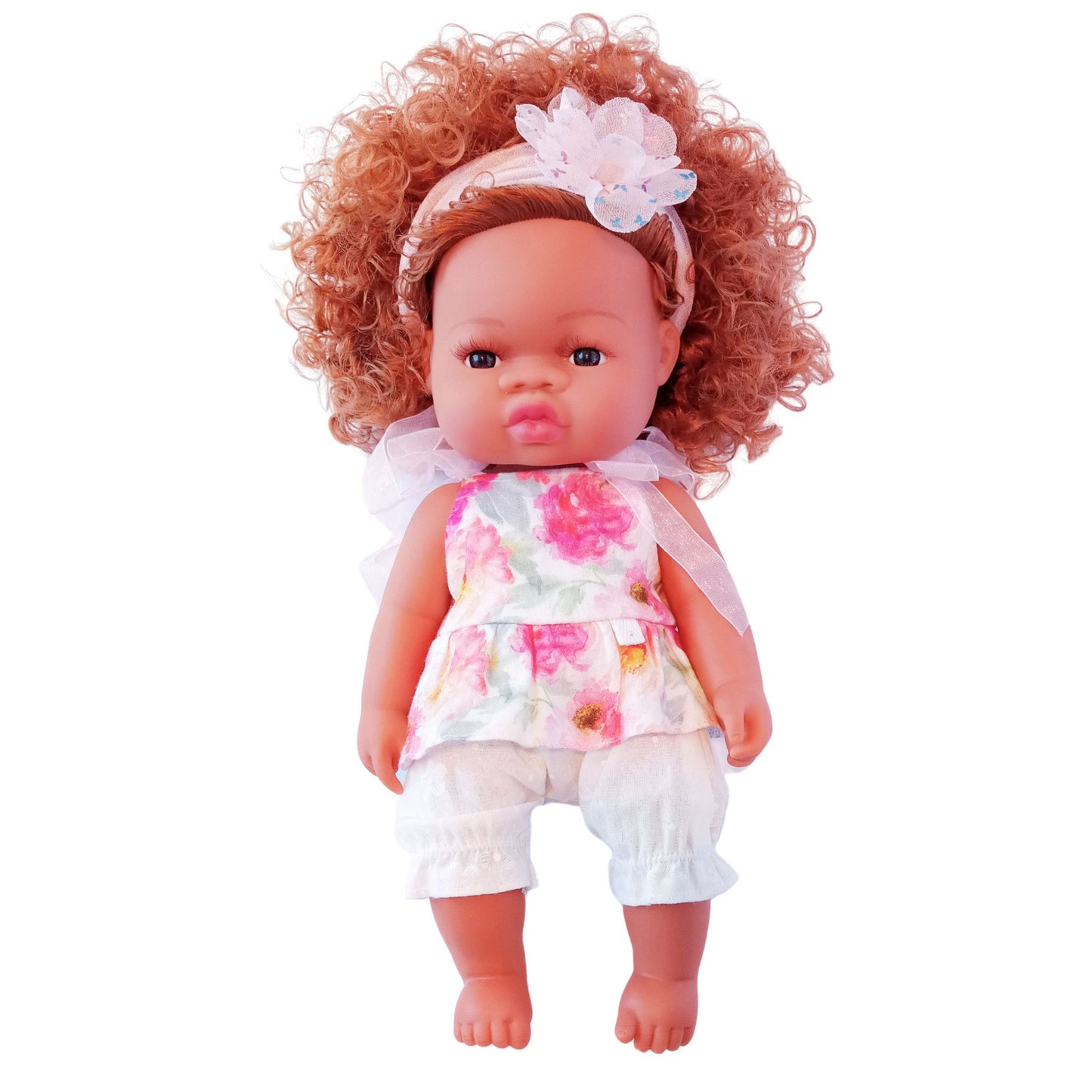 Doll wearing floral cotton top and white bloomers, styled for 34 cm dolls like Paola Reina and Baby Born.