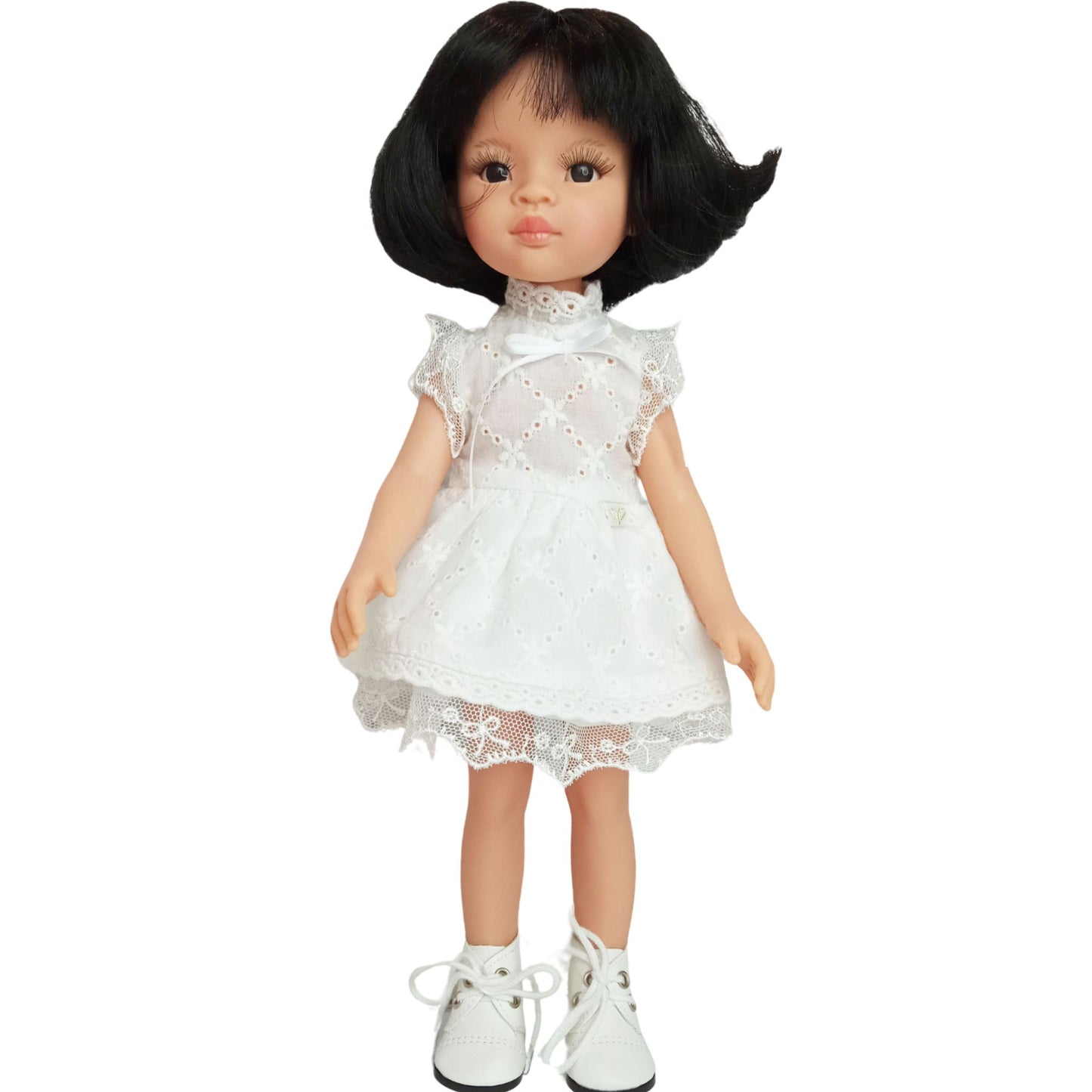 Handmade white lace dress for dolls with short black hair, featuring intricate lace details and matching white boots.