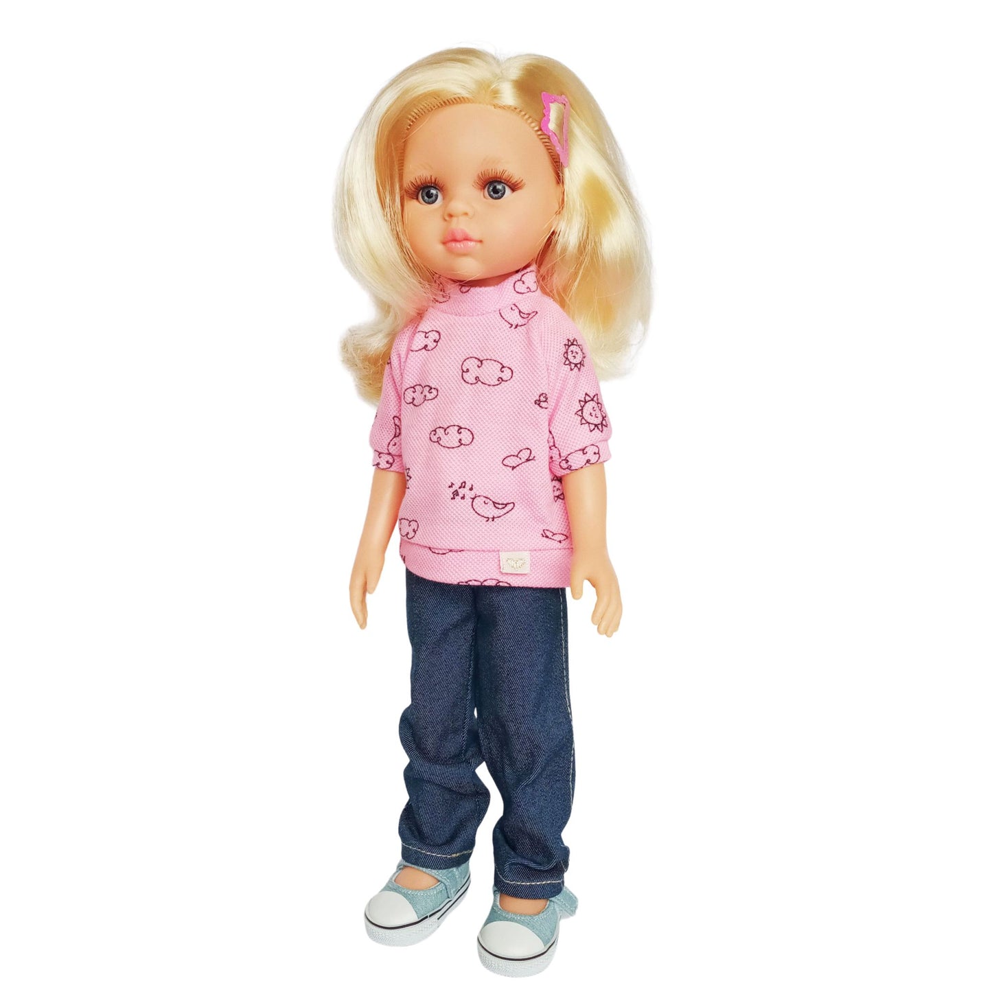 Paola Reina 32 cm dolls wearing pink blouses with cloud prints, one styled with denim pants and the other with denim shorts and sneakers.