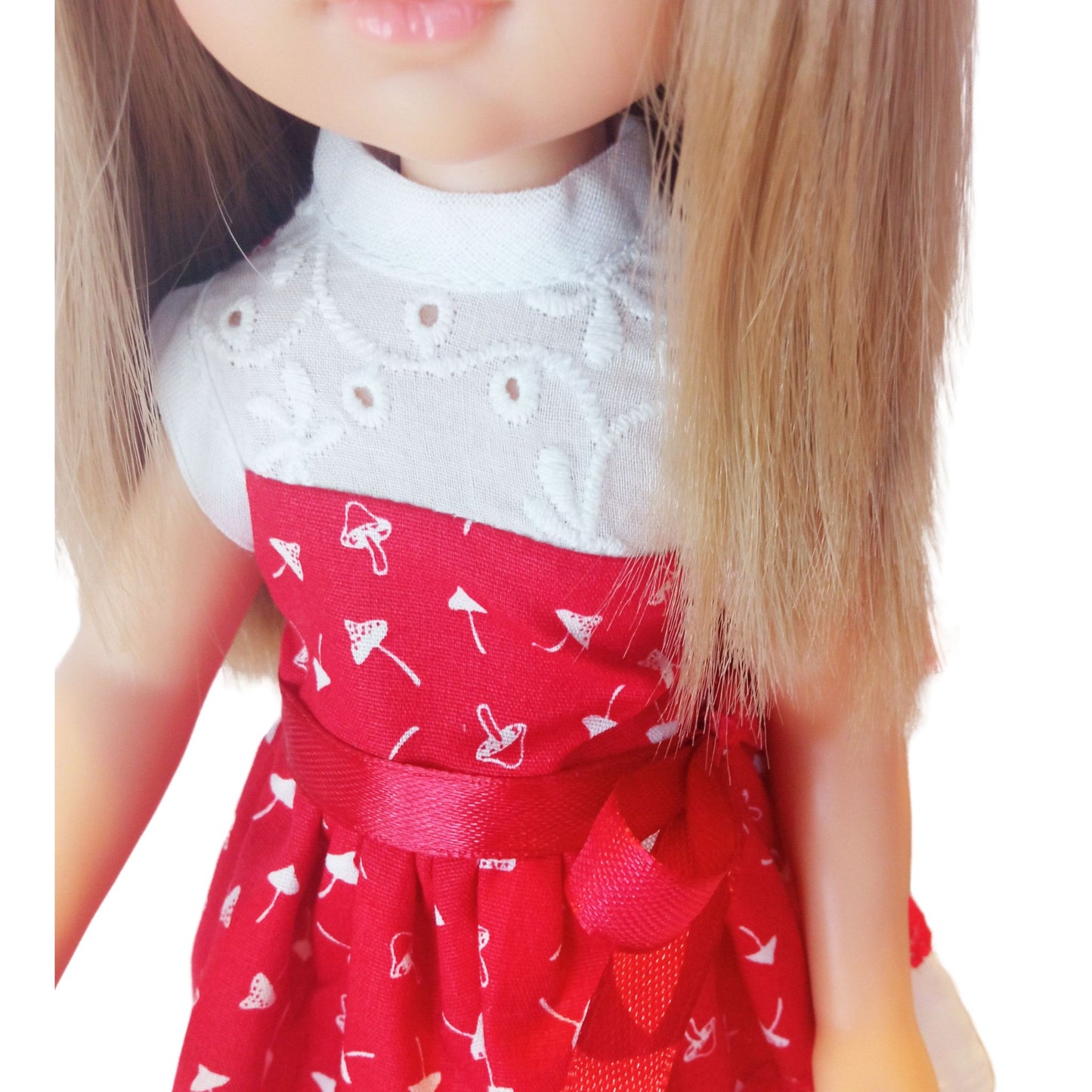 Red and white doll dress with a lace bodice, fly agaric mushroom print, and a satin bow, paired with red lace-up boots, designed for a 32 cm Paola Reina doll.