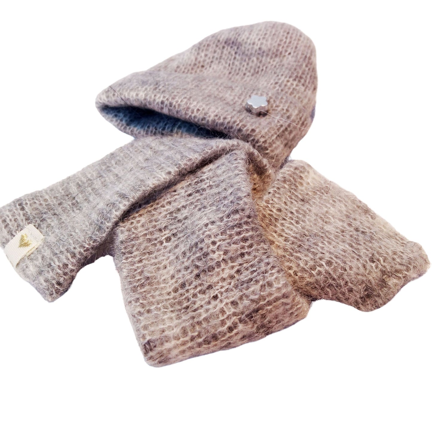 Wearing a soft gray knitted hat with a tiny star detail and a matching scarf, dressed in a cozy outfit for Paola Reina 32 cm doll.