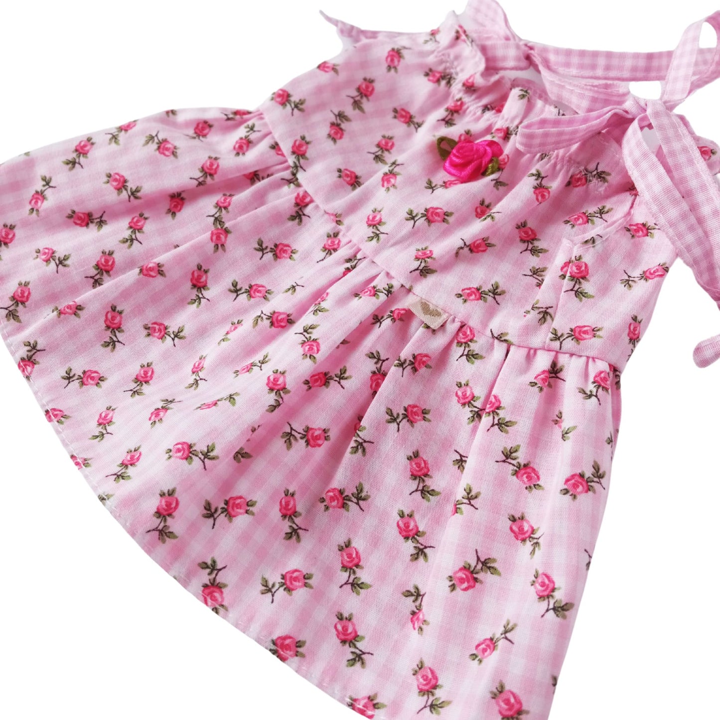 A pink floral cotton summer dress with shoulder ties and rosebud decoration, made for 34 cm dolls like Paola Reina or Baby Born.