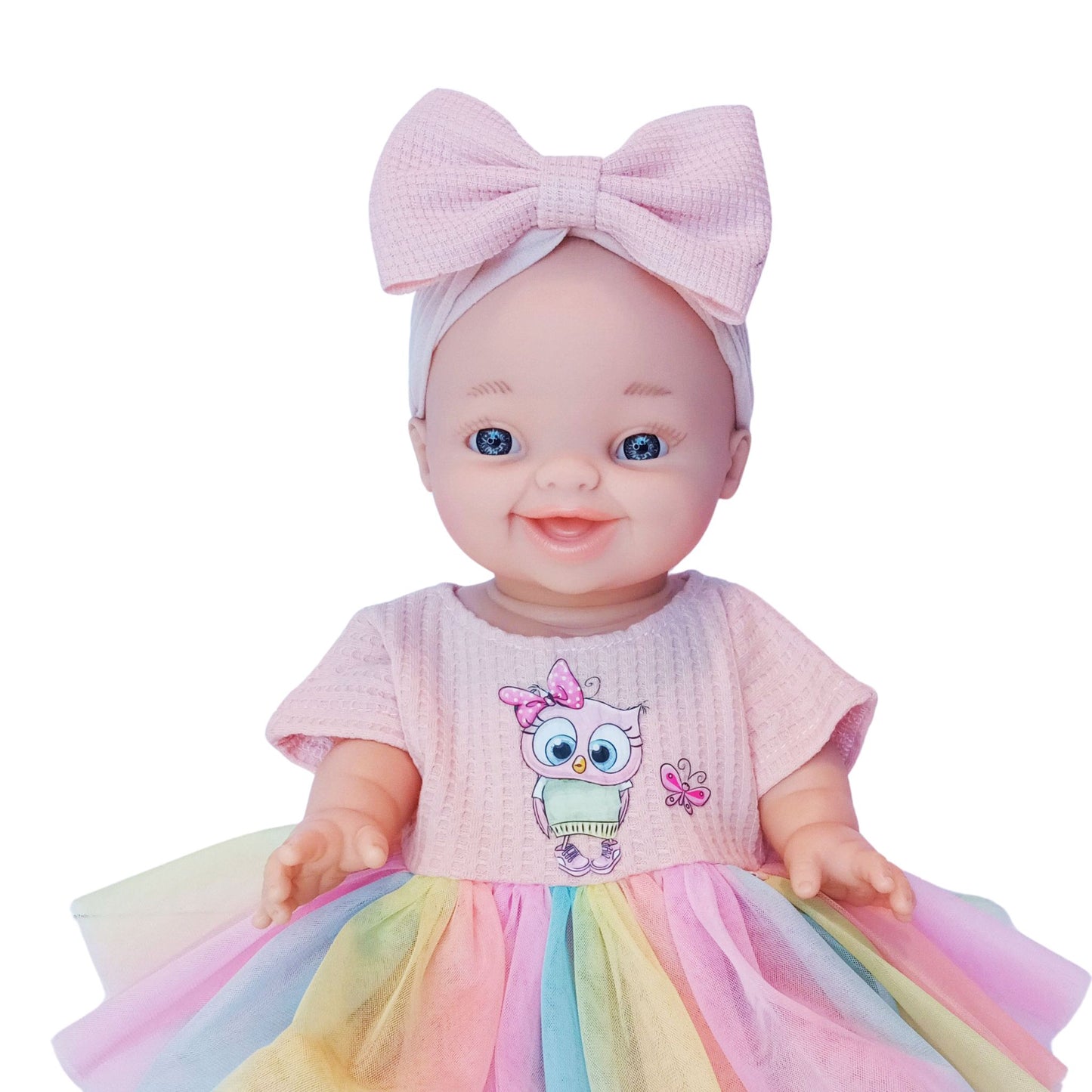 Smiling doll in peach jersey dress with rainbow tulle skirt and cute owl embroidery, perfect for 34 cm Paola Reina or Baby Born dolls.