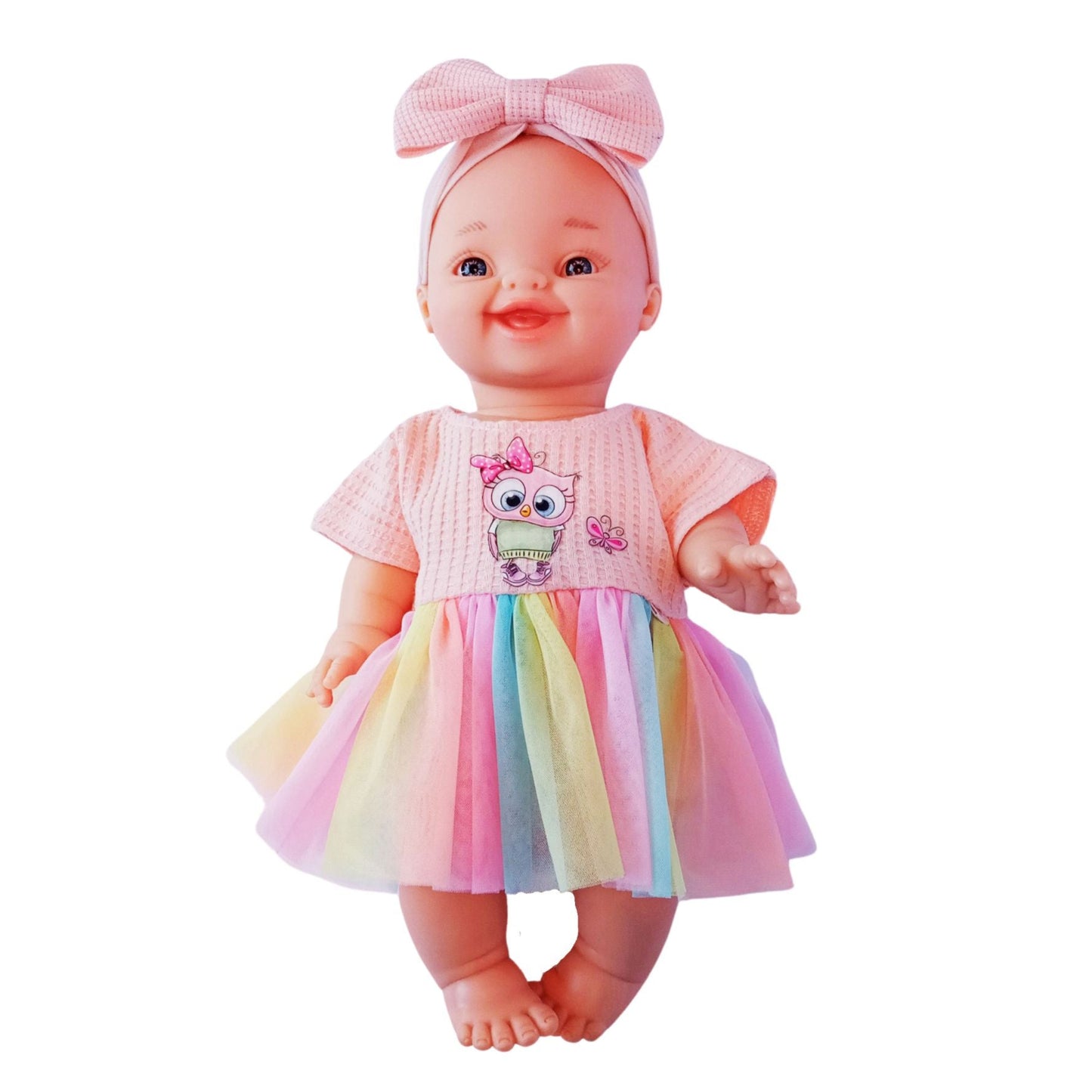 Smiling doll in peach jersey dress with rainbow tulle skirt and cute owl embroidery, perfect for 34 cm Paola Reina or Baby Born dolls.