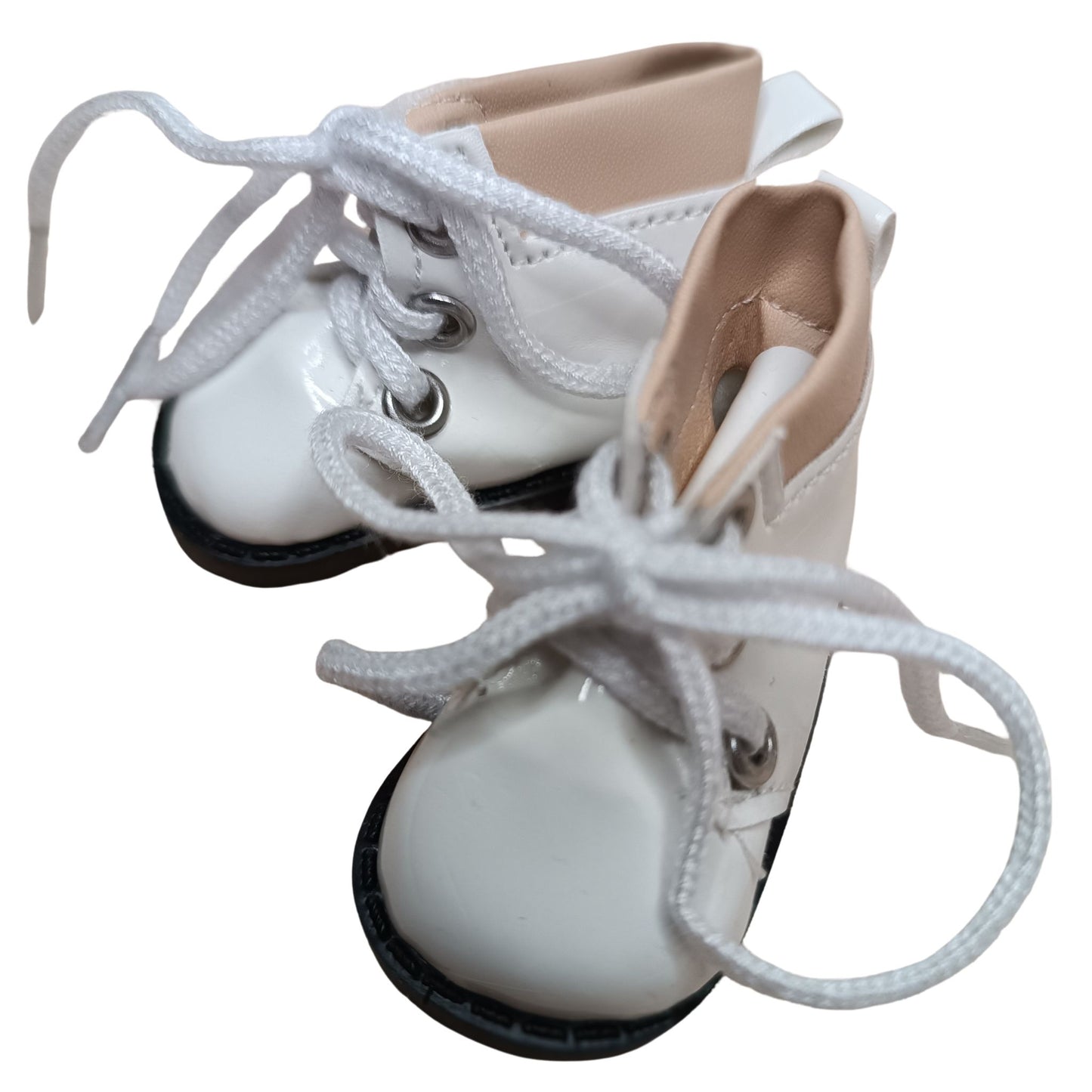 Glossy white lace-up boots with beige cuffs, designed for 32 cm Paola Reina dolls. Featuring white laces, metal eyelets, and black soles for a stylish look.