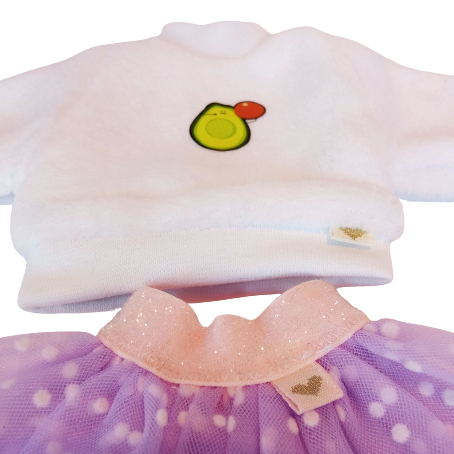 Stylish Paola Reina dolls dressed in white plush sweatshirts with cute embroidery and fluffy polka-dot mesh skirts.