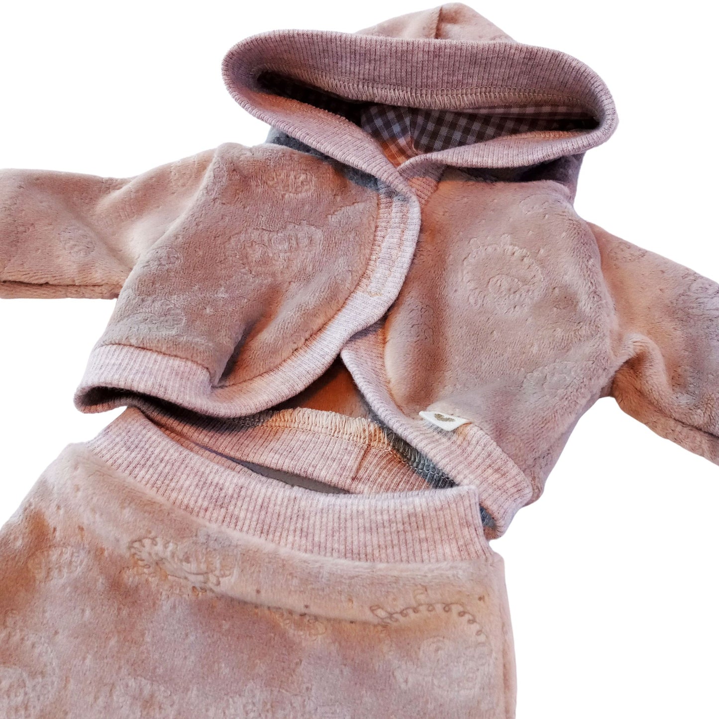 Doll wearing soft beige velour hoodie blouse and matching pants, designed for 34 cm dolls like Paola Reina and Baby Born.