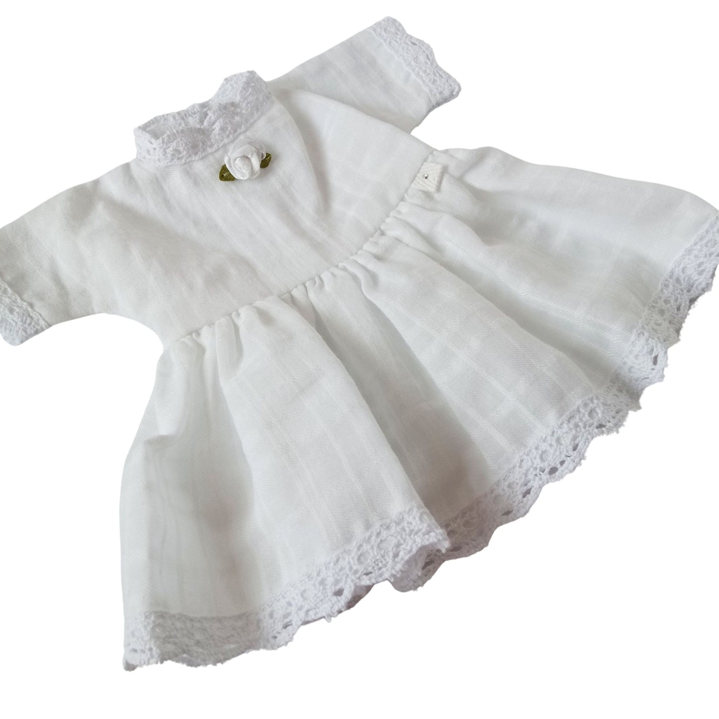 A white cotton summer dress with lace trim and floral accent, perfect for 34 cm (13 inch) dolls.