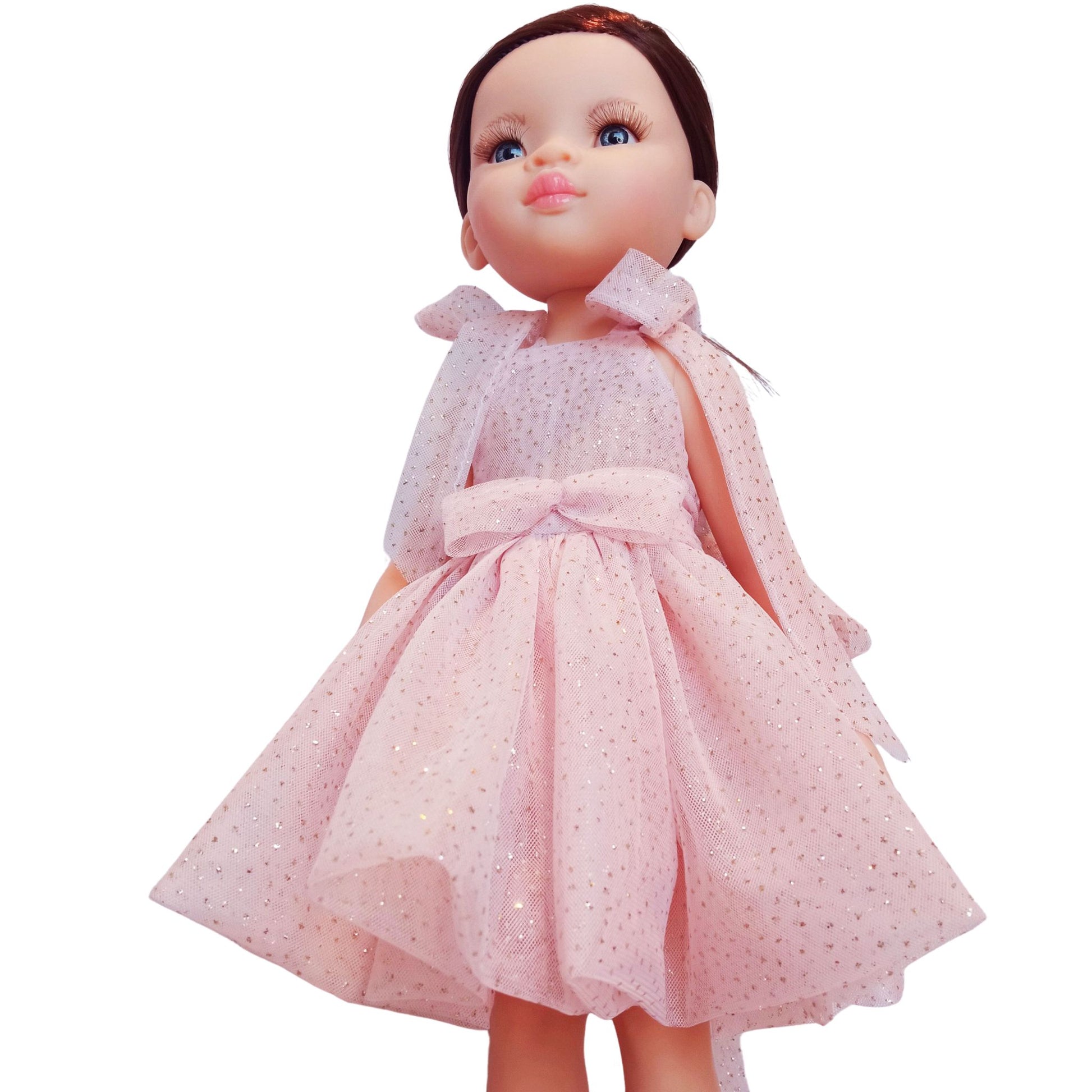 Paola Reina Las Amigas 32 cm doll wearing an elegant pink dress with a bow, lace-up boots, and stylish accessories.