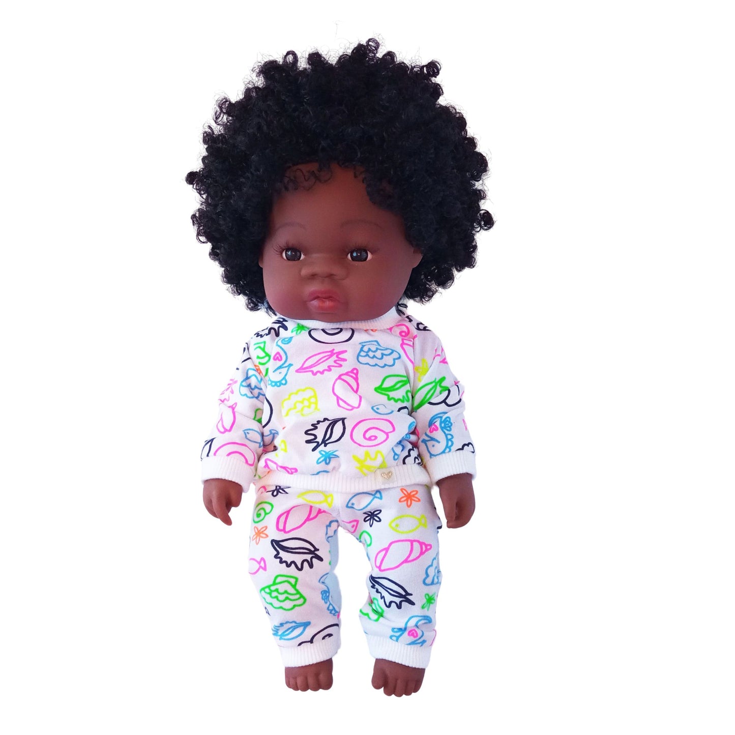 Doll in colorful doodle-print cotton blouse and pants set, sized for 34 cm dolls like Paola Reina and Baby Born.