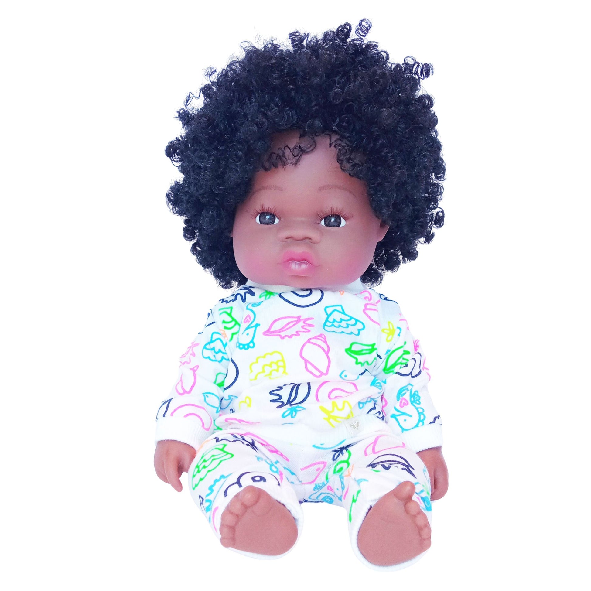 Doll in colorful doodle-print cotton blouse and pants set, sized for 34 cm dolls like Paola Reina and Baby Born.