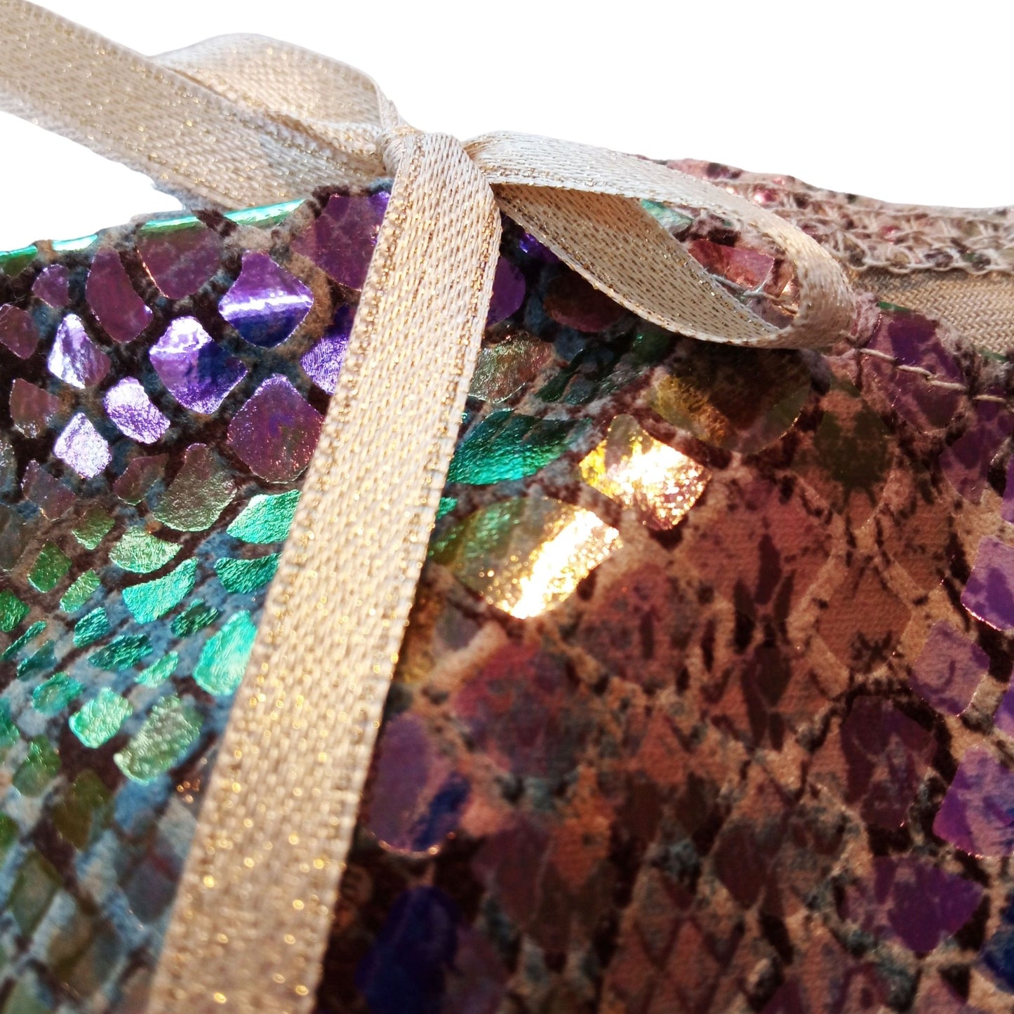 A shimmering green and gold sequined dress for a 12-inch/32 cm Paola Reina doll, featuring gold ribbon ties and a luxurious party-ready design.