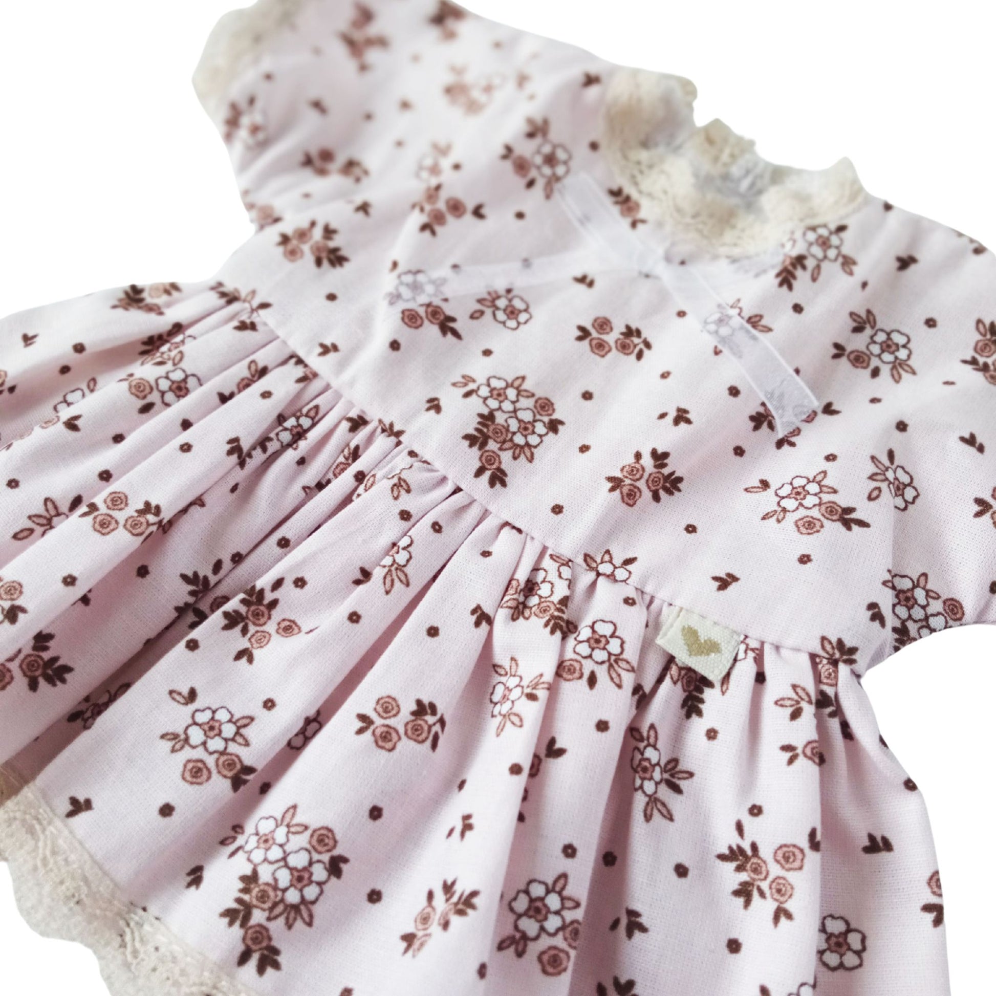A vintage-style cotton dress with brown floral print and lace edging, fits 34 cm (13 inch) Paola Reina, Baby Born, and similar dolls.